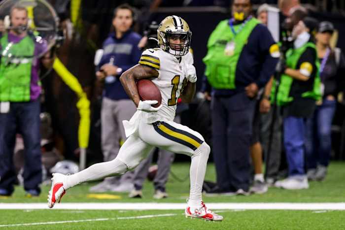 Dec 2, 2021; New Orleans Saints wide receiver Deonte Harris (11) scores a touchdown against the Dallas Cowboys. Mandatory Credit: Stephen Lew-USA TODAY Sports